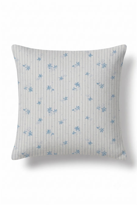 A square throw pillow featuring a light gray and white vertical stripe pattern with small blue floral motifs, shown against a plain white background.