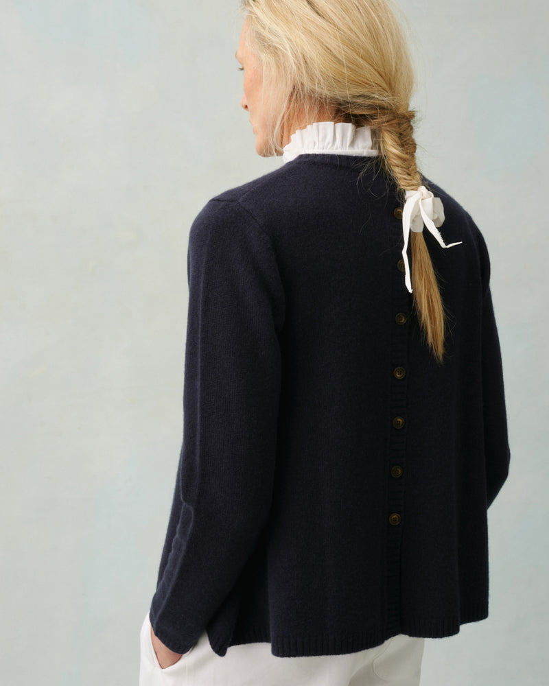 https://www.cabbagesandroses.com/products/button-back-crew-sweater-in-navy-merino-cashmere